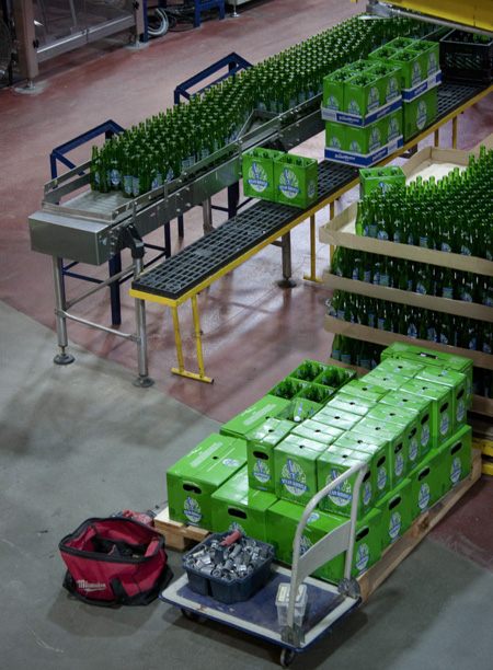 steamwhistle brewery in toronto: the bottling line, in brilliant green