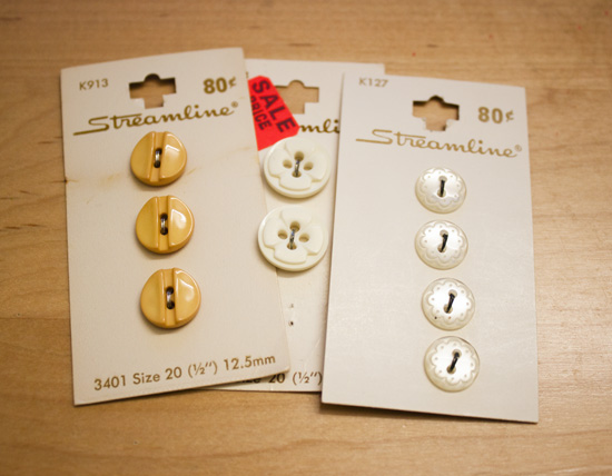 golden yellow buttons, white decorative buttons (the gold ones are my favorite!)