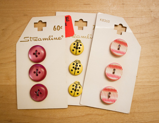 pink buttons, yellow bug buttons