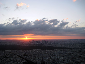 view of paris sunset from the top of the eiffel tower