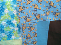 flannel baby blankets, made from scrap pieces and ready to be donated