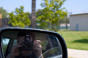 brad taking a picture of himself in the car mirror brad taking a picture of himself in the car mirror