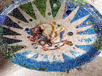 sea-themed ceiling mosaic at parc guell, barcelona