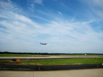 united plane landing on the runway