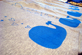 whale screenprint tees, all in a row