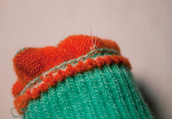 stitch buttons to knit: step 7 stitch buttons to knit: step 7