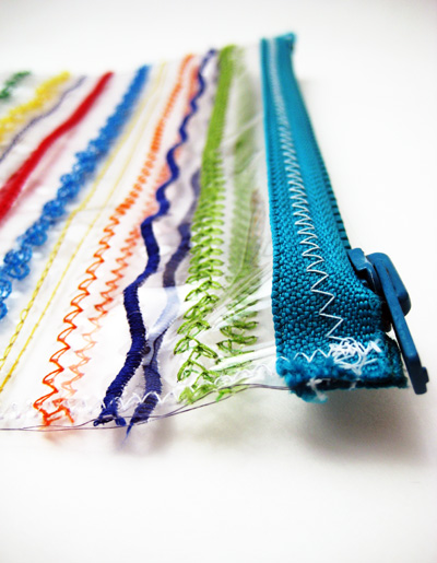 clear vinyl zipper pouch with fancy machine stitching